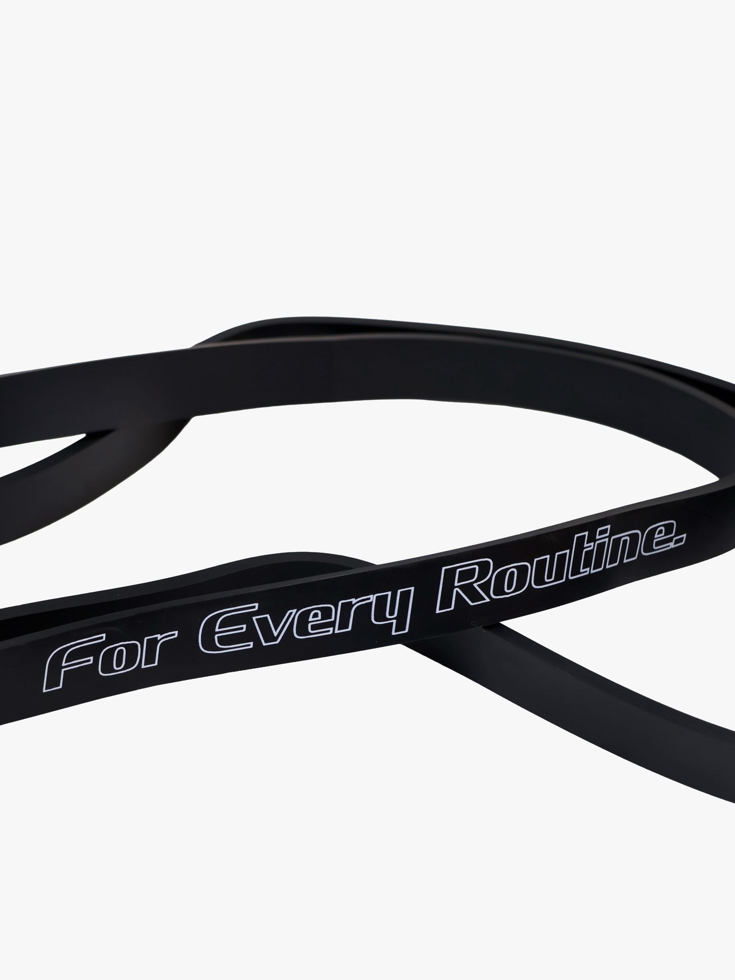 Close-up of the Myo+ Power Band Heavy resistance showing the For Every Routine tagline and premium matte finish