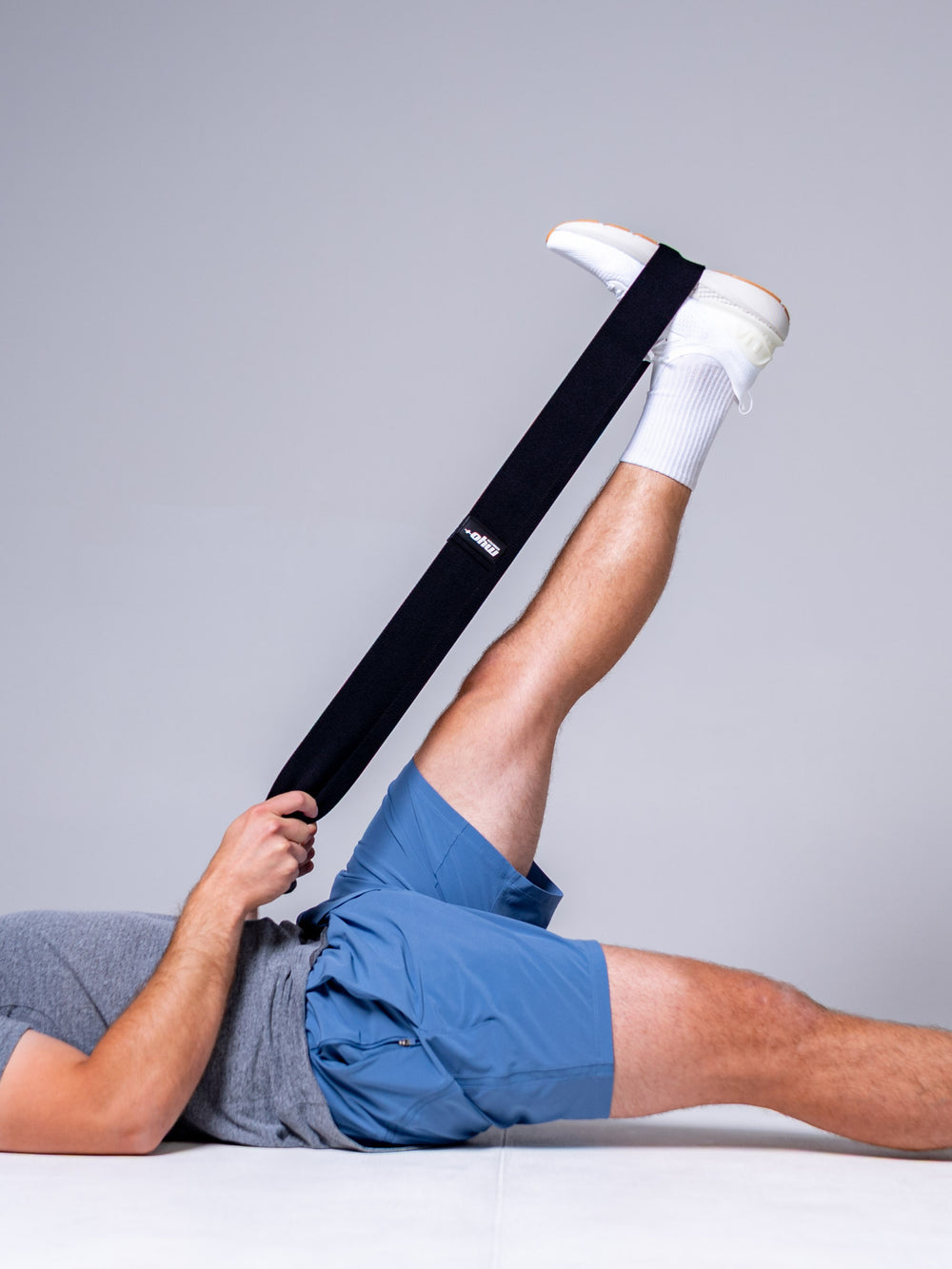 Myo+ StretchBand in use stretching out the hamstrings